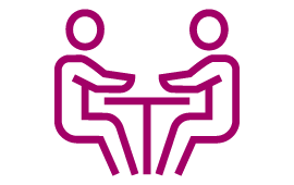 Icon zwei Personen am Tisch